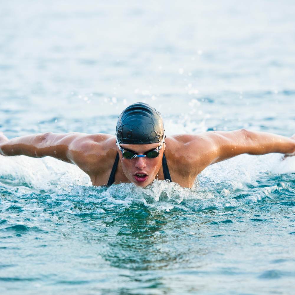 A white male swimming